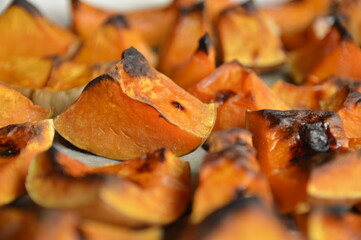 slices of baked orange pumpkin close up