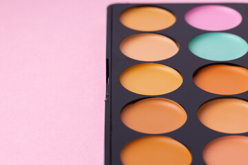 Cosmetics for face complexion on pink background