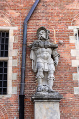 Fototapeta na wymiar Archaic warrior statue at the Great Arsenal in Gdansk, Poland