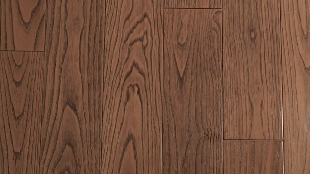 Natural Wood Structure of American Walnut, Natural Walnut Floors in the Interior, Parquet, Board, Solid Wood for Finishing. Background Made of Walnut Wood.