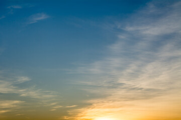 Naklejka na ściany i meble Colorful sky lit by the setting sun.