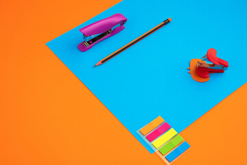 Stationery in bright pop colors with visual illusion effect, modern art. Collection, set for education. Copyspace for ad. Youth culture, stylish things around us. Trendy creative workplace.