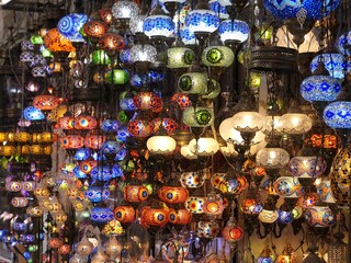 Istanbul, Turkey, October 15, 2020: Handmade, brightly coloured oriental Turkish lamps hang outside a store in Istanbul’s famous Grand Bazaar. 