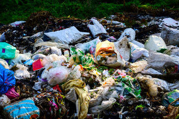 Garbage pollution from small towns  Incinerated and disposed of incorrectly A source of pollution And spread the disease.Smoke of burning garbage into the air- pollution from waste garbage .