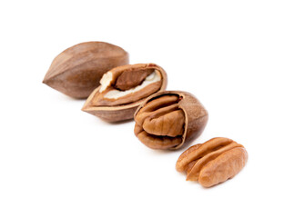 Fresh pecan nuts isolated on white background
