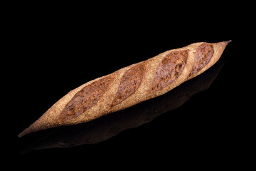 Freshly baked homemade bread isolated on black. French bread baguette. Healthy eating and traditional bakery, baking bread concept