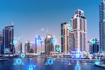 Skyscrapers of Dubai business downtown. International hub of trading and financial services. Lock icon hologram, concept of datum security. Double exposure. Dubai Canal waterfront.