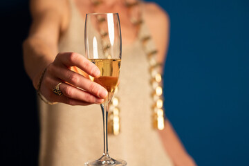 woman holding champagne glass New Year's eve party