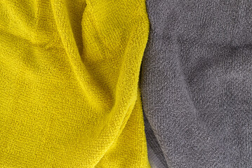 Fototapeta premium Two tone grey and yellow frote textile background