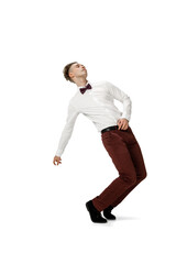 Fototapeta na wymiar Icon. Happy young man dancing in casual clothes or suit, remaking legendary moves and dances of celebrity from culture history. Isolated on white. Action, motion, fame concept. Creative occupation.