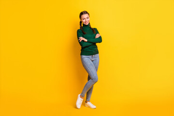 Fototapeta na wymiar Photo portrait full body view of woman with folded arms isolated on vivid yellow colored background