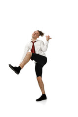 Rock. Happy young man dancing in casual clothes or suit, remaking legendary moves and dances of celebrity from culture history. Isolated on white. Action, motion, fame concept. Creative occupation.