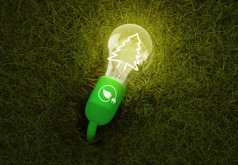 Top view of a lamp holder planted in a meadow that grows with a inserted bulb with a lit filament made in a pine shape to simulate the concept of sustainable energy