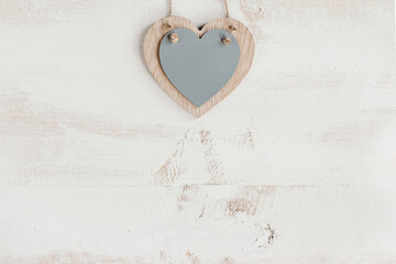 wooden grey heart with copy space
