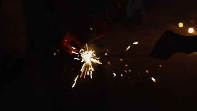 Party, holidays, nightlife and happy new year concept - Happy women having fun with sparklers