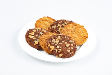 Homemade chocolate chip and oatmeal cookies isolated on white background.