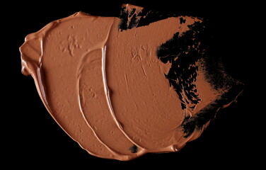 Makeup cream isolated on black background and texture with clipping path, top view