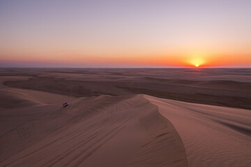 Obraz na płótnie Canvas Panorama of the desert of Qatar at sunset