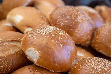 Fresh sesame round buns for sale at the local farmers market