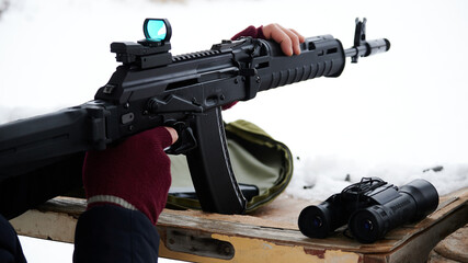 Shooter aim through a KOBRA-type callimator of Russian or Chinese production on a modified...