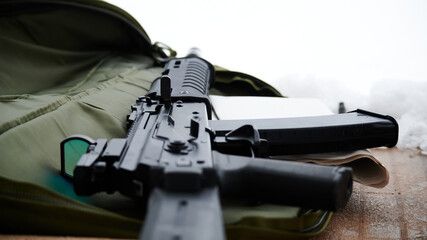 Saiga (the civilian version of the Kalashnikov auto mate 7.62 or 5.45 mm) lies on its own case. Russian production