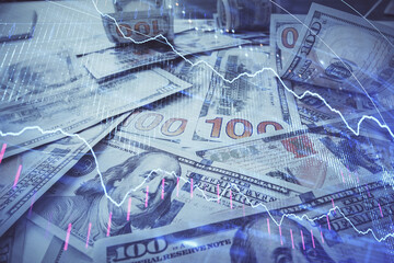Multi exposure of forex chart drawing over us dollars bill background. Concept of financial success markets.