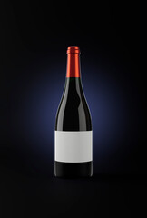Bottle of red wine in a dark background