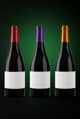 Three Bottles of red wine in a dark background