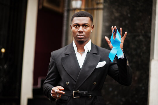 African American Man Hold Blue Prostate Ribbon. Awareness Cancer Of Men Health.