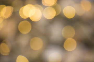 Obraz premium Festive Christmas bokeh. Beautiful golden lights for design