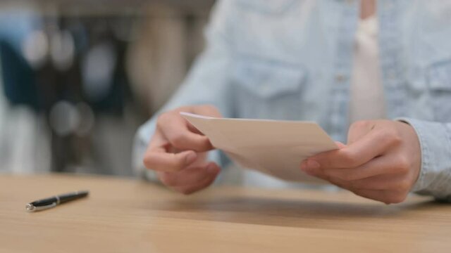 Male Hands Taking Envelop Opening Letter and Signing, Close up 