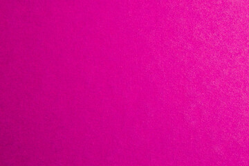 pink background with dense paper texture