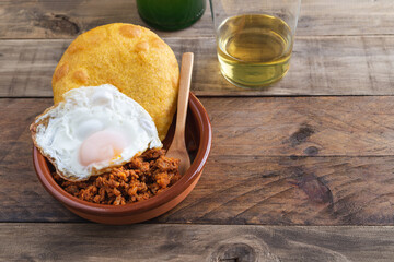 Corn tortos with marinated meat and fried egg. Copy space.