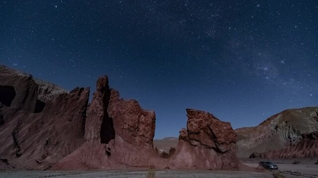 Night time-lapse 4k of Stone formation in Atacama Desert, Arcoiris Valley in San Pedro de Atacama, Chile.