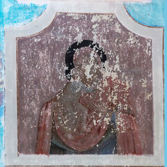 wall painting of an icon in an abandoned orthodox church