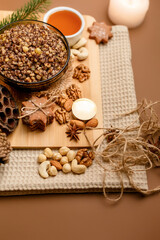 Kutia is a wheat Christmas porridge.  Traditional Christmas dish of the Slavs. Kutia with raisins, nuts, poppy and honey on dark background. Top view. Christmas atmosphere. 