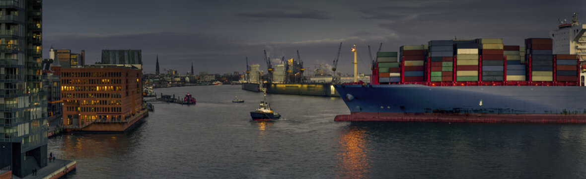 Large Container Ship During A Turning Maneuver In The Port Of Hamburg 