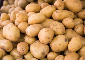 potatoes on counter in market