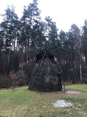 old wooden mill in forest