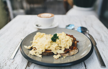 Breakfast and coffee on table in cafe