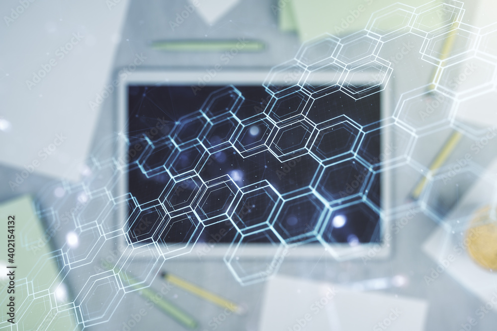 Poster Creative concept of wireless technology with hexagon hologram and modern digital tablet on background, top view. Big data and database concept. Multiexposure