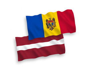 National vector fabric wave flags of Latvia and Moldova isolated on white background. 1 to 2 proportion.