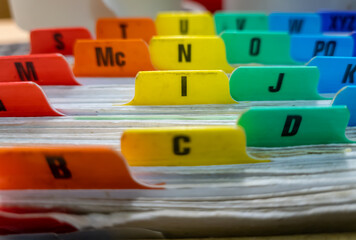 Paper card index filing system.