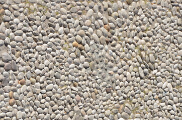 Pavement made of river gravel seen on an Italian street