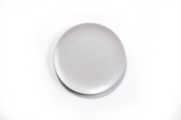 Empty Matte Grey Plate isolated on white background top view