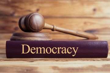 democracy law books and a judge