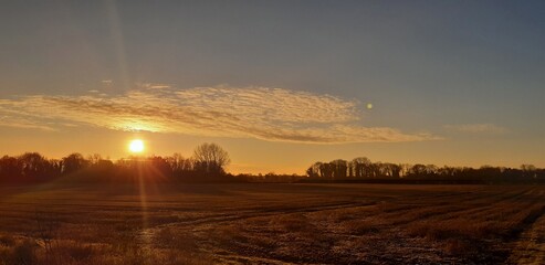 Sunrise over farmers field