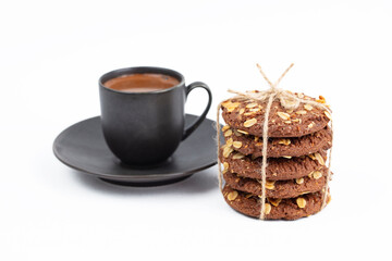 delicious cookies and a cup of coffee. Isolated on white background