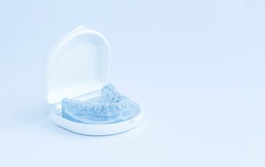 Fototapeta premium Mandibular impression with bruxism protection in white case.
