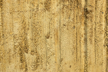 Sandy surface after excavator bucket run